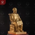 Tượng Bác Hồ ngồi ghế mây bằng đồng đỏ cỡ nhỏ