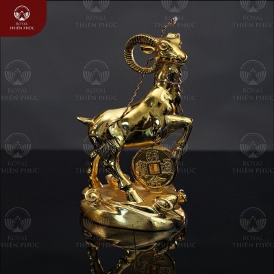 Tượng con dê gác chân lên đồng xu cao 15cm bằng đồng mạ vàng