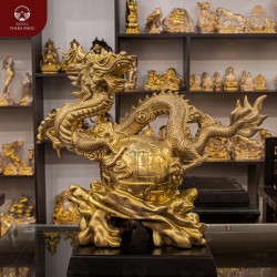 Tượng con rồng bay lượn quanh địa cầu bằng đồng catut cao 45cm