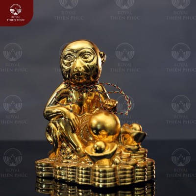 Tượng khỉ phong thủy ngồi trên tiền cao 15cm bằng đồng mạ vàng