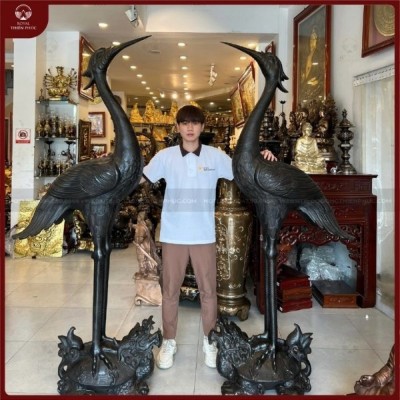 Hạc cưỡi long quy đồng đỏ hun đen