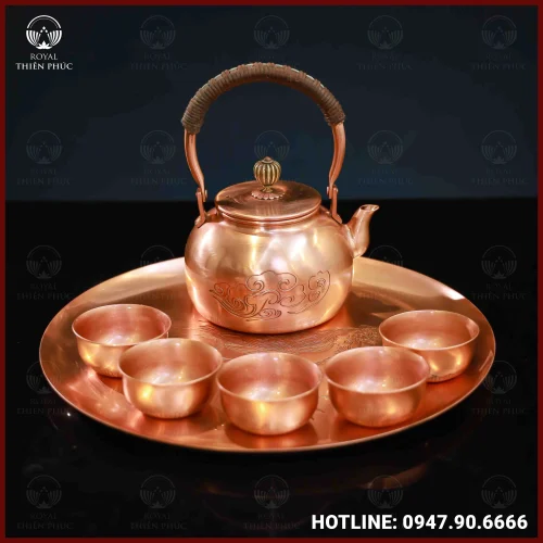 Bộ ấm chén đồng đỏ chạm khắc tinh xảo